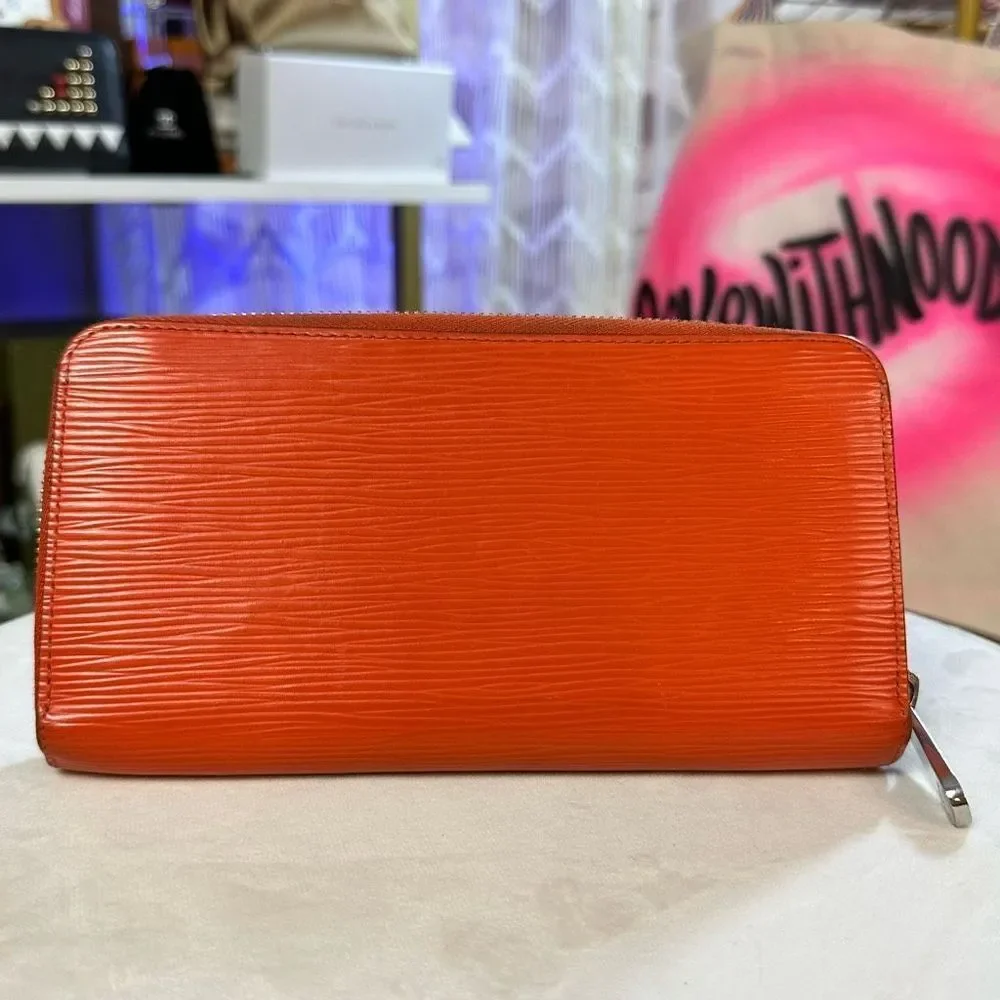 LOUIS VUITTON Long Wallet Epi Zippy Orange Women's Men's Leather